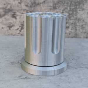 A Silver Revolving Pen holder - desk tidy