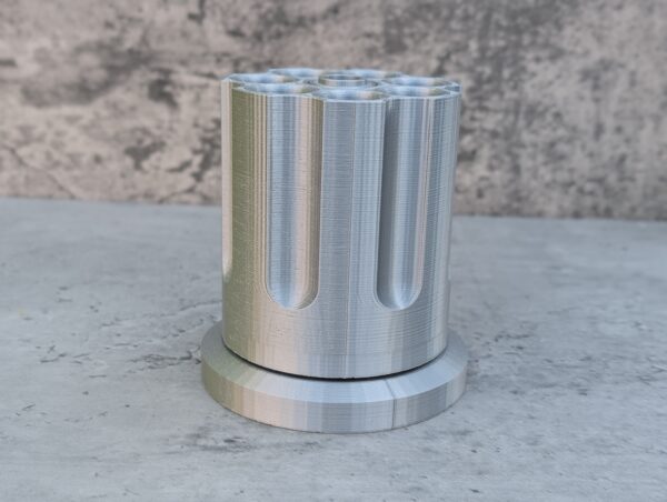 A Silver Revolving Pen holder - desk tidy